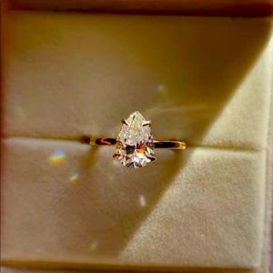 Solid 10k gold 2.5ct pear moissanite ring